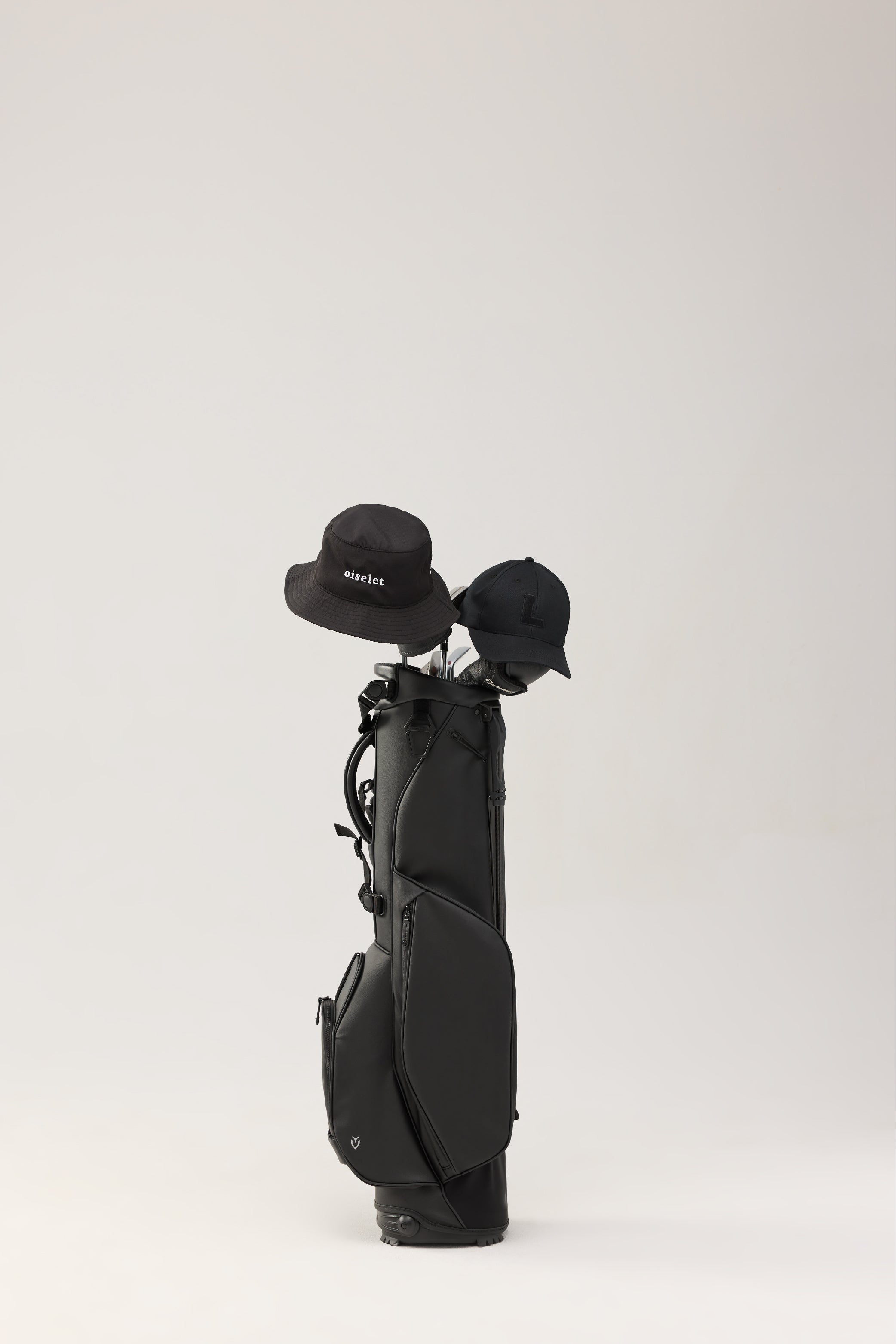 Lecolet Golf bucket hat in black with the word oiselet embroidered on the front