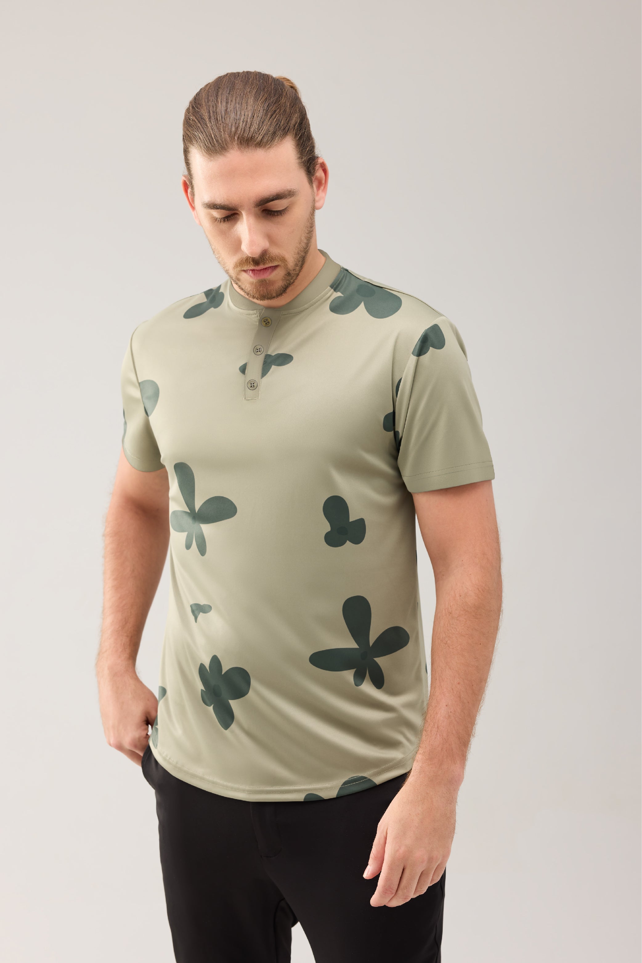 Lecolet SEED golf polo Green blossom. Green golf polo with darker flower design.