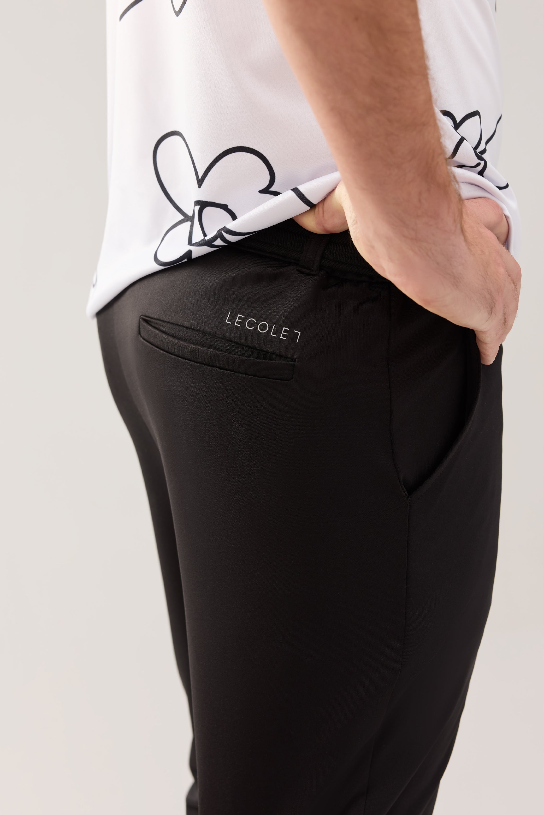 Lecolet STEM golf jogger in black. Lecolet logo over back right pocket.