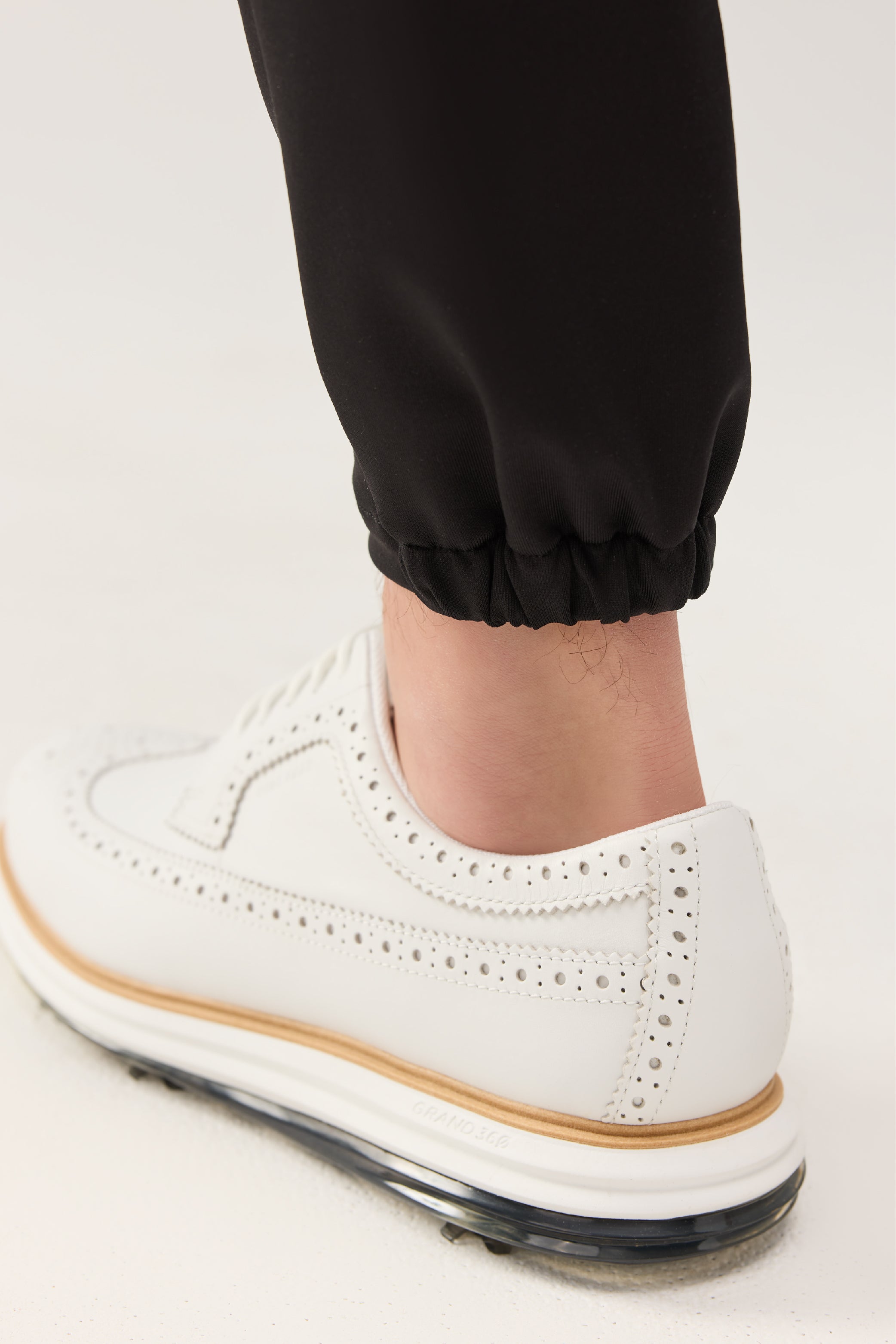 Lecolet STEM golf jogger in black. Elastic at ankles.